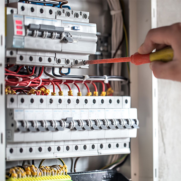 MVS Plastering and Electrical - working on a fuseboard